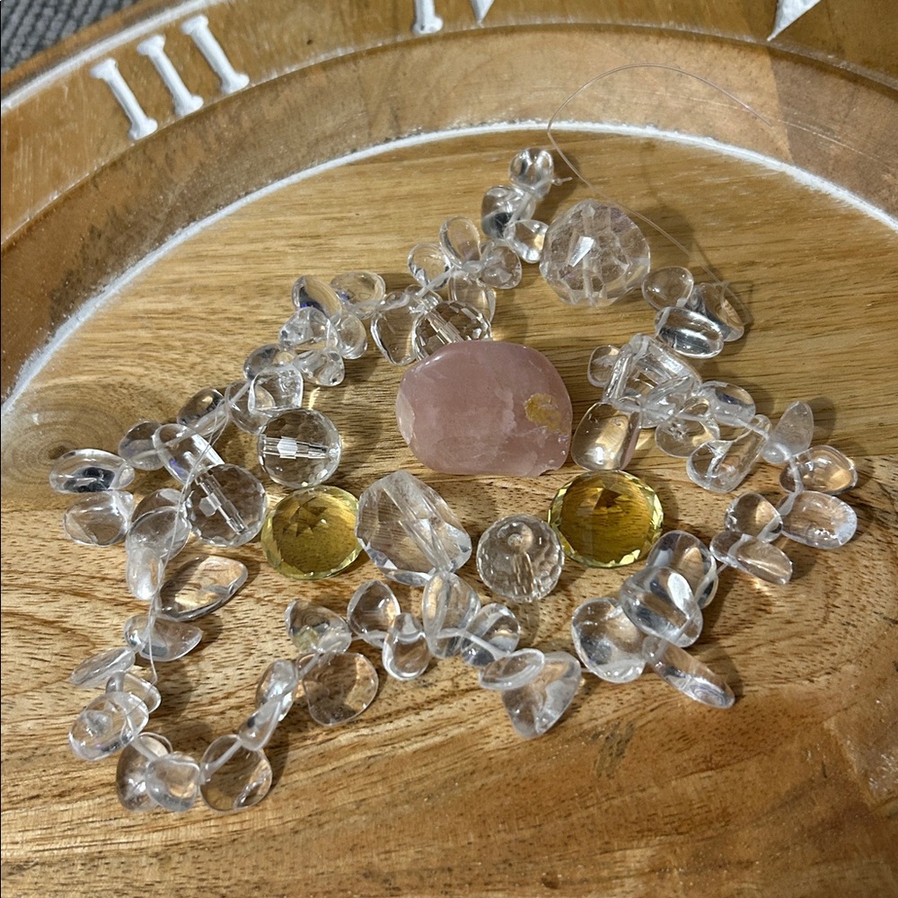 Clear and Yellow Gemstones a piece of rose quartz & polished rocks stones